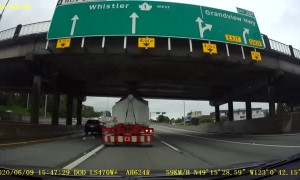 Oversize Load Scrapes Against Overpass