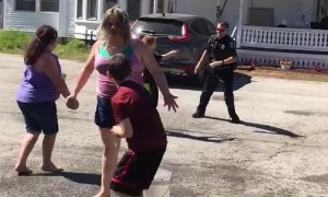 Kids Enjoy Water Balloon Battle With Police Officer