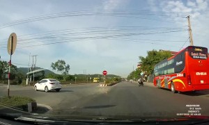 Sudden Swerve Causes Motorist to Climb Curb