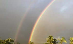 Double Rainbow Stretches across India Sunset