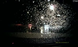 Power Wires Envelop Transport Truck on a Rainy Evening