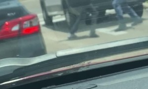 Mailman Stands His Ground in Street Fight