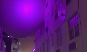 Buildings Connected by Giant Balloon