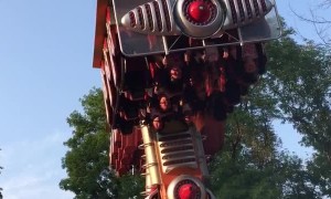 Amusement Park Ride Stops Upside-Down