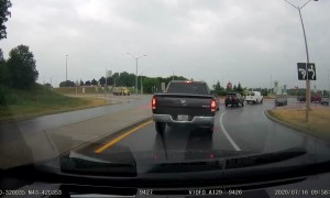 Dump Truck Loses Control in Roundabout