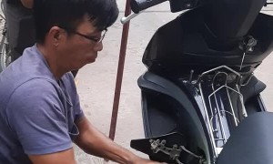 Removing a Snake from a Moped