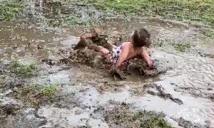 Kiddo Plays in Mud Puddle