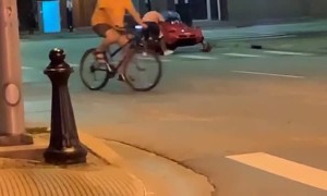 Riding a Snowmobile Through Downtown in Summer