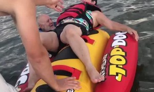 Couple Struggle to Board Hotdog Tube