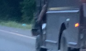 Wholesome UPS Driving Swinging Leg at Work