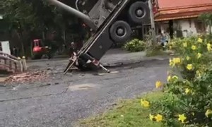 Crane Crushes Crematorium