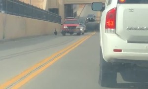 Impatient Driver Speeds Through Turkey's Holding up Traffic