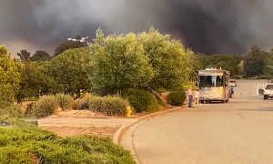 Fire retardant dropping from a T944 River Fire