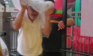 Burger King Employee Protecting Customers From the Rain