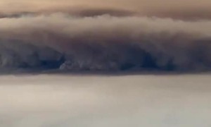 View of Creek Fire from airplane looks apocalyptic