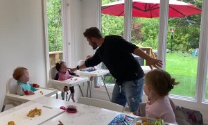 Toddler and Triplets Have a Laugh at Lunch