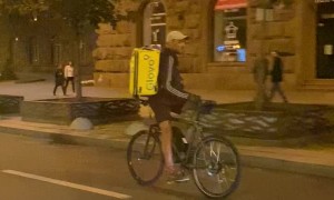 Food Delivery Guy Rides Backward