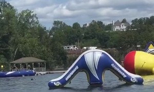 Girl Catches Massive Air from Fat Boy Float at Water Park