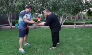 Man Opens a Watermelon Using Only His Fingers
