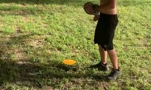 Disk Golfer Rescues Baby Squirrel from Snake