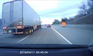 Deer Jumps From Bridge Onto Interstate