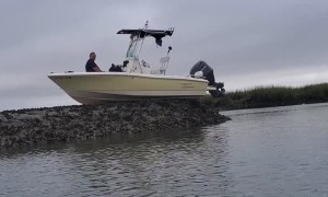 Man Patiently Waiting For The Tide To Come Back