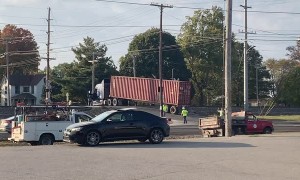 Train Rolls Through Stranded Semi