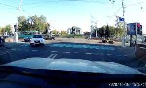 Elderly Driver Clips Man on Electric Scooter