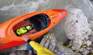 Kayaker Gets Caught on Tree during River Lap
