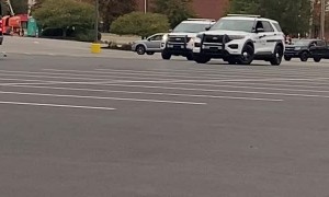 Truck Drives Circles Around Police in Parking Lot