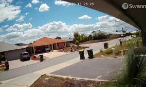 Sudden Wind Gust Throws Bins Across Street