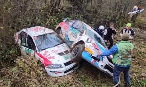 Rally Cars Struggle to Make Turn at Race Track