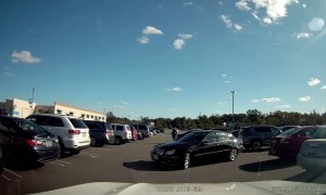 Two Vehicles Backing Out of Parking Spots Collide