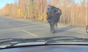 Motorcyclist Pops a Long Wheelie
