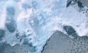 Frozen Money Found in Snow Filled Driveway