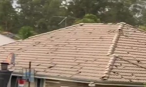 Huge Hail Smashes Right Through Roof