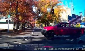 Truck with Trump Flag Runs Red Light