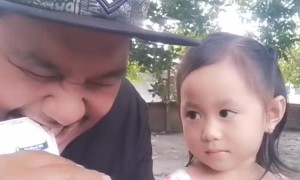 Dad Surprises Daughter While Opening a Milk