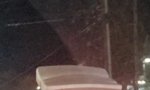 Mattress Catches Wind as SUV Drives Along