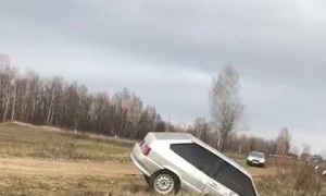Drifting Car Overcorrects into Ditch