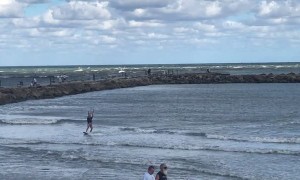 Kite Surfer Flies Through the Air