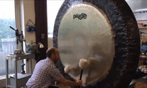 Gong Master Creates Eerie Music on Giant Gong