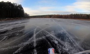 Motocross Rider Drives Across Beautiful Frozen Lake