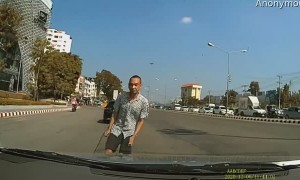 Driver Avoids Peculiar Man in Traffic