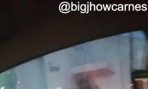 Very Calm Man in His Car in the Middle of a Flash Flood