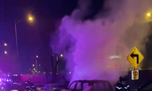 Fire Department Hoses Down Flaming Car