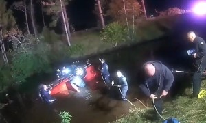 OPD officers help firefighters rescue family in submerged vehicle