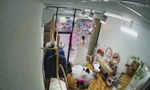 Wedding Dress Mannequin Takes a Dive