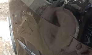 Using a Hot Water Pour to Fix a Car Dent