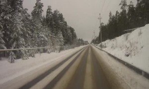 Overtaking Car Slides Into Oncoming Traffic Head-On